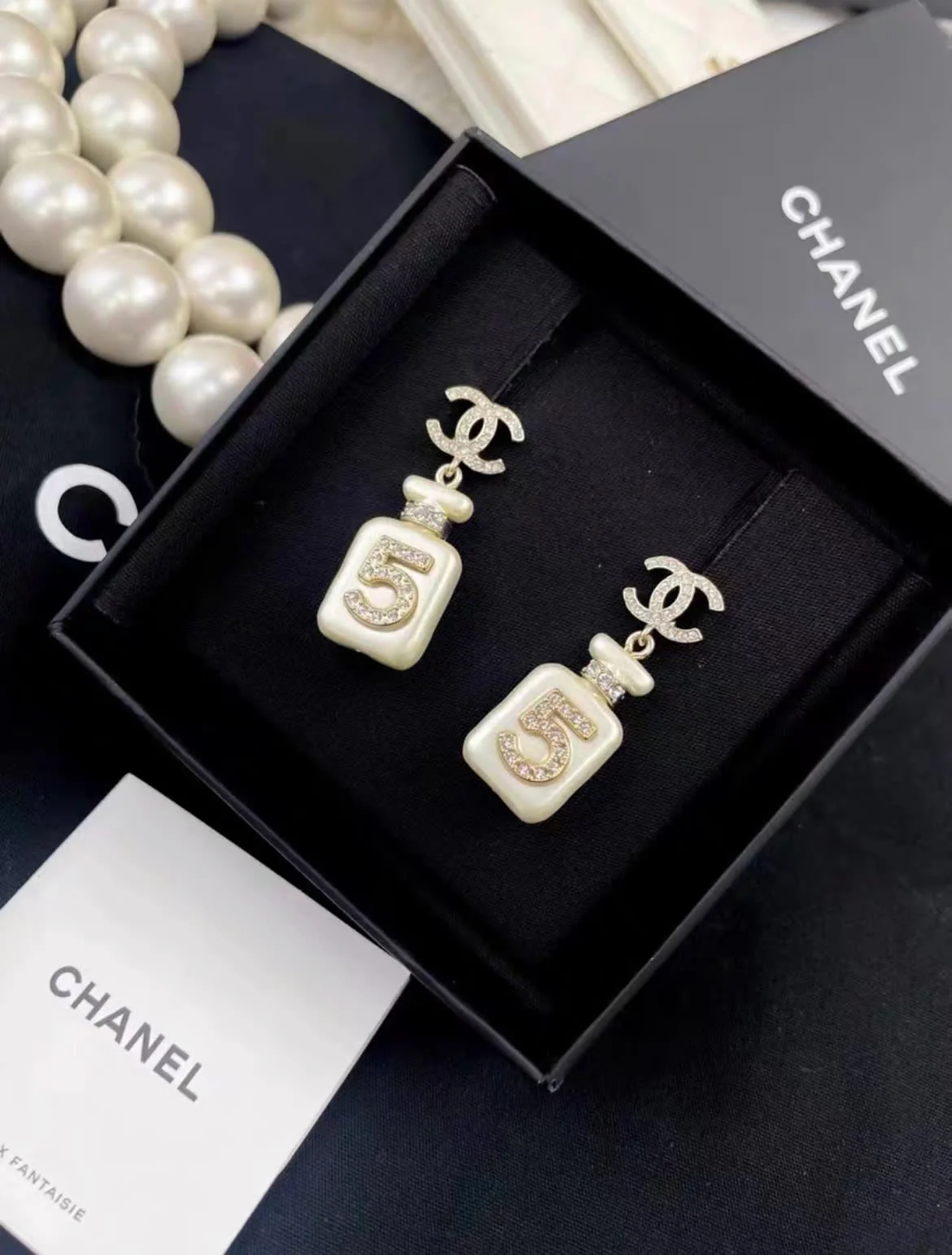 Chanel 22S No. 5 White Perfume Bottle Pendant Diamond Double C Earrings