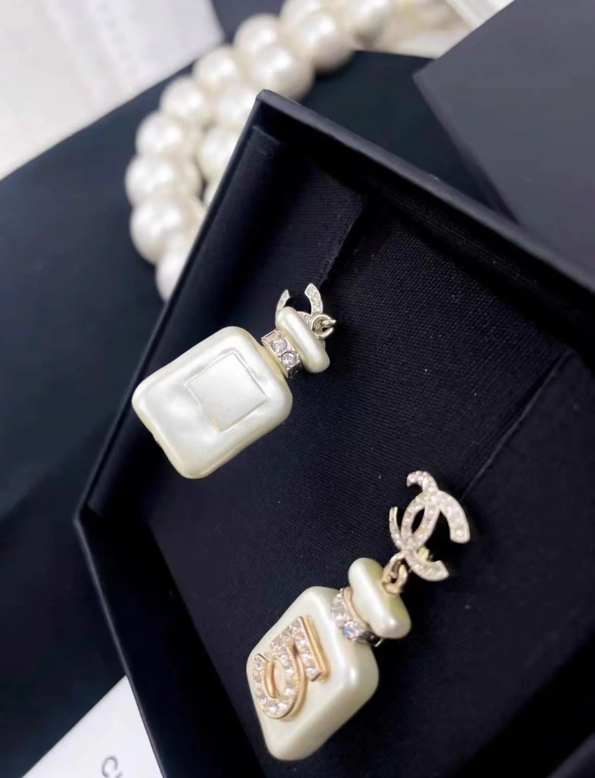 Chanel 22S No. 5 White Perfume Bottle Pendant Diamond Double C Earrings - Image 4