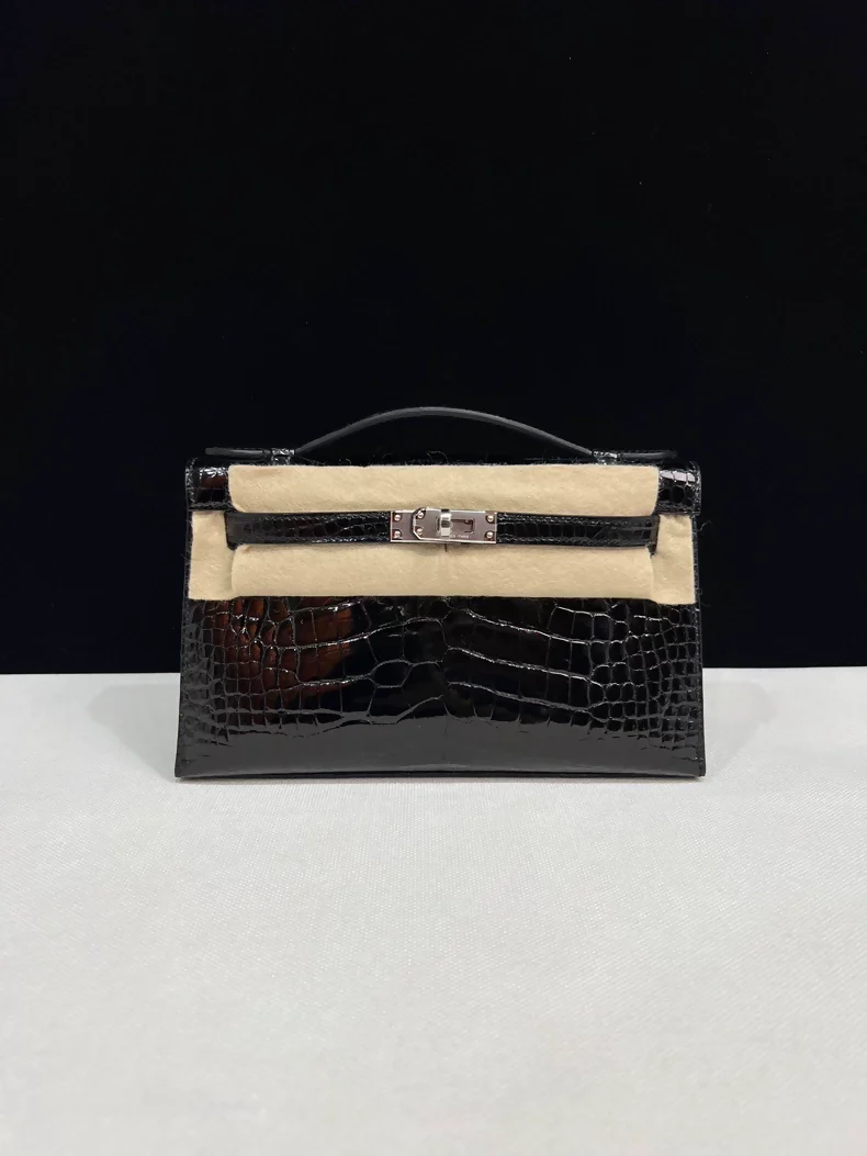 Hermes Kelly Pochette Black shiny Crocodile Leather with palladium hardware