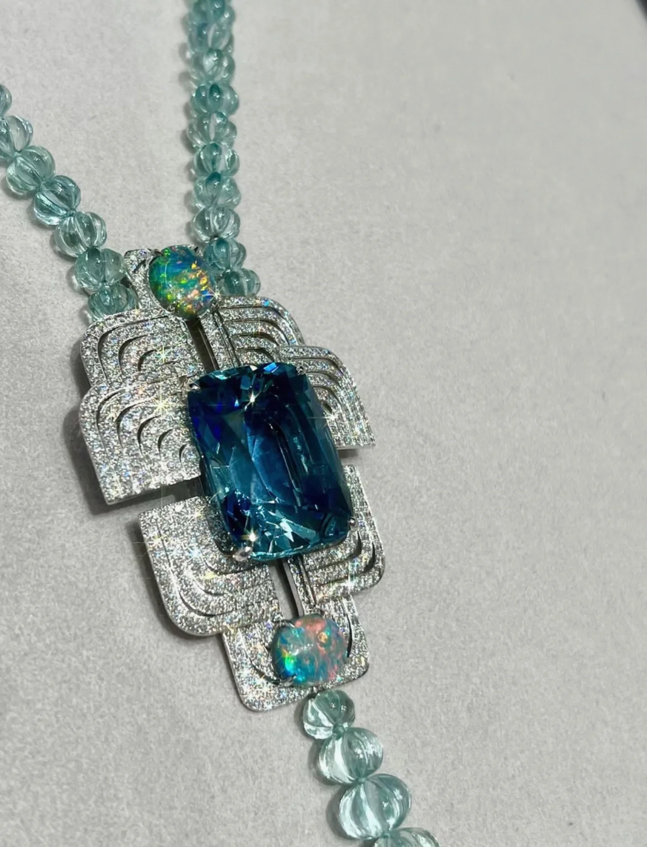 Cartier High Jewelry Necklace - Main stone: 37-carat aquamarine; two opals; chain beads: topaz. - Image 7