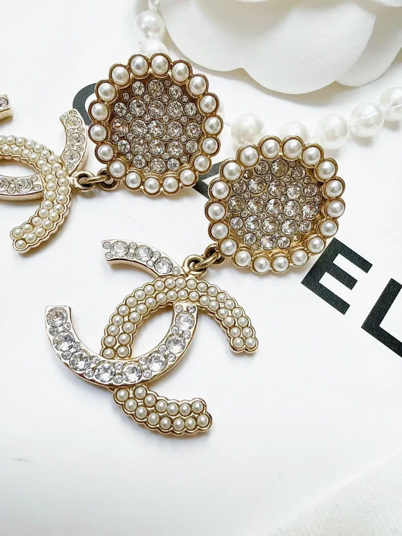 Chanel 21k pearl double C earrings - Image 2