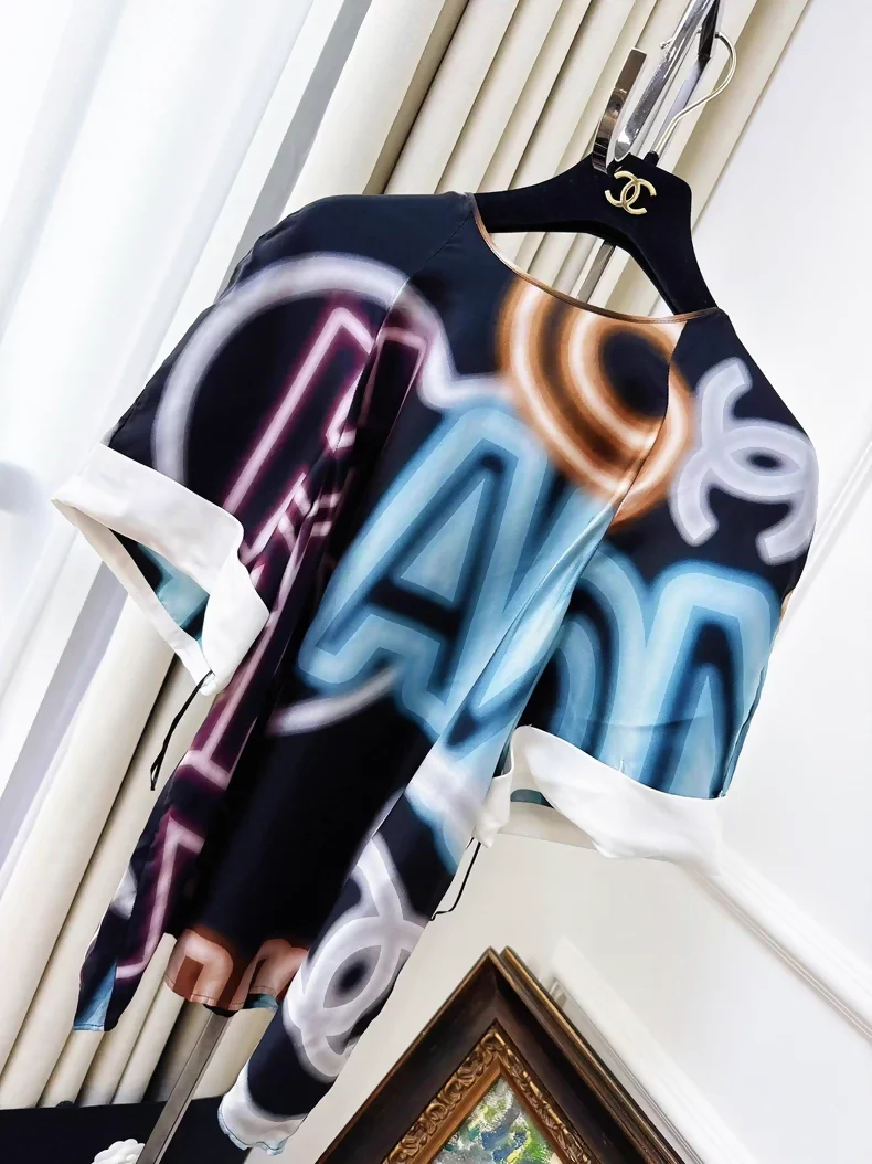 Chanel 21s ice blue neon silk top