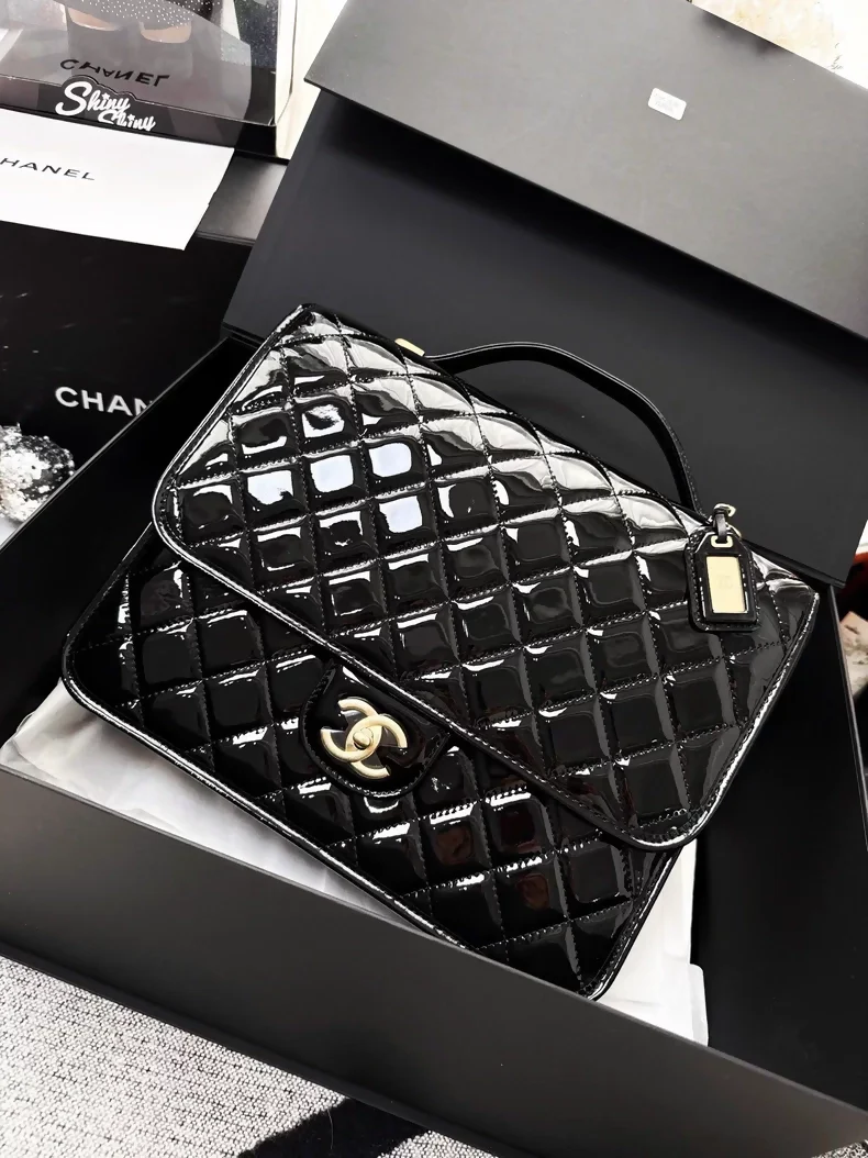 Chanel 22k black patent leather backpack