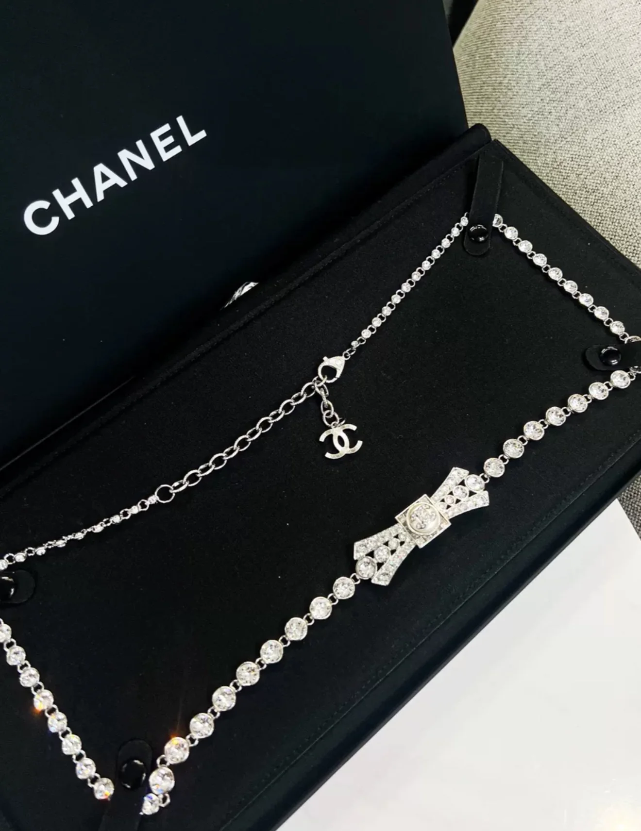 Chanel 23S bow diamond pearl double C waist chain