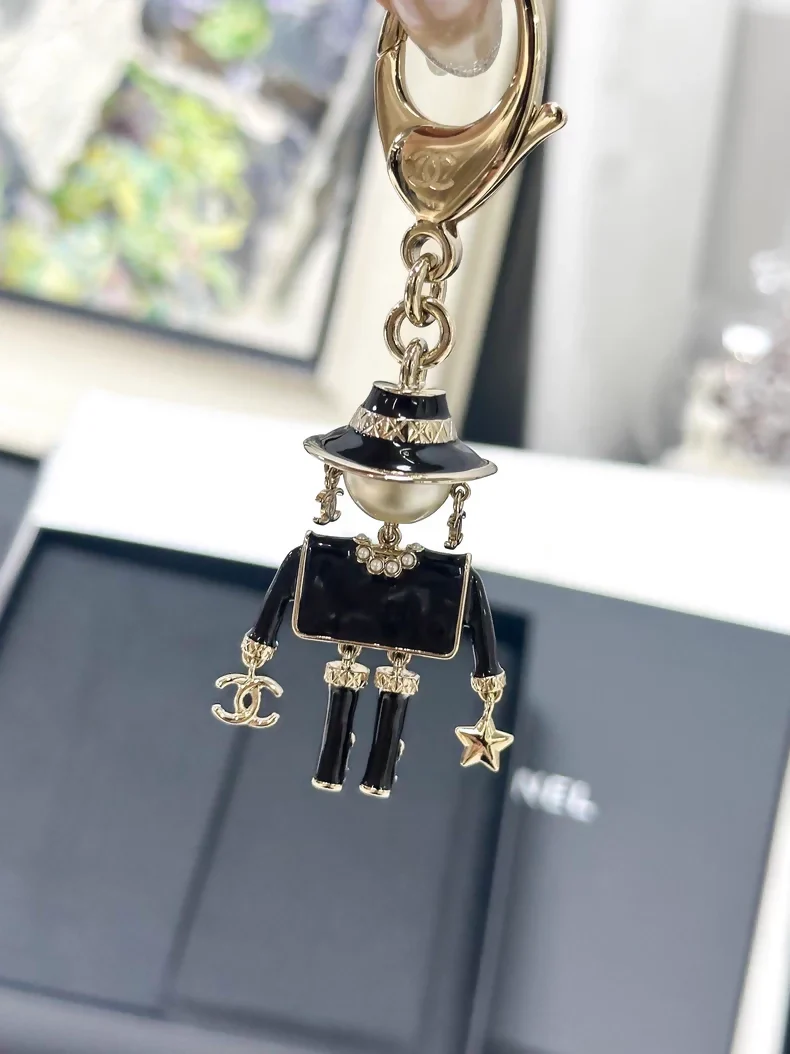 Chanel 25B black robot pendant/keychain - Image 2