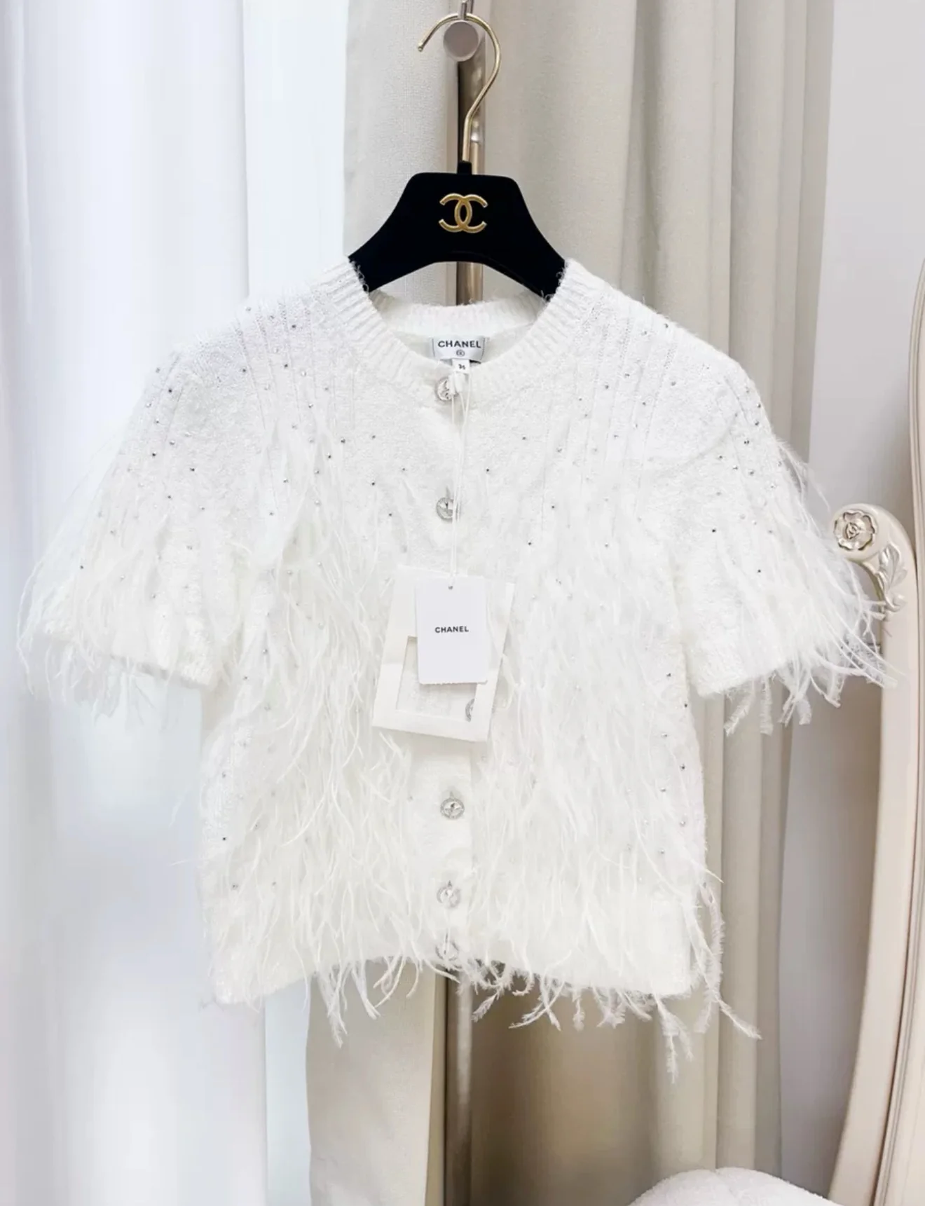 Chanel 25S white feather cardigan