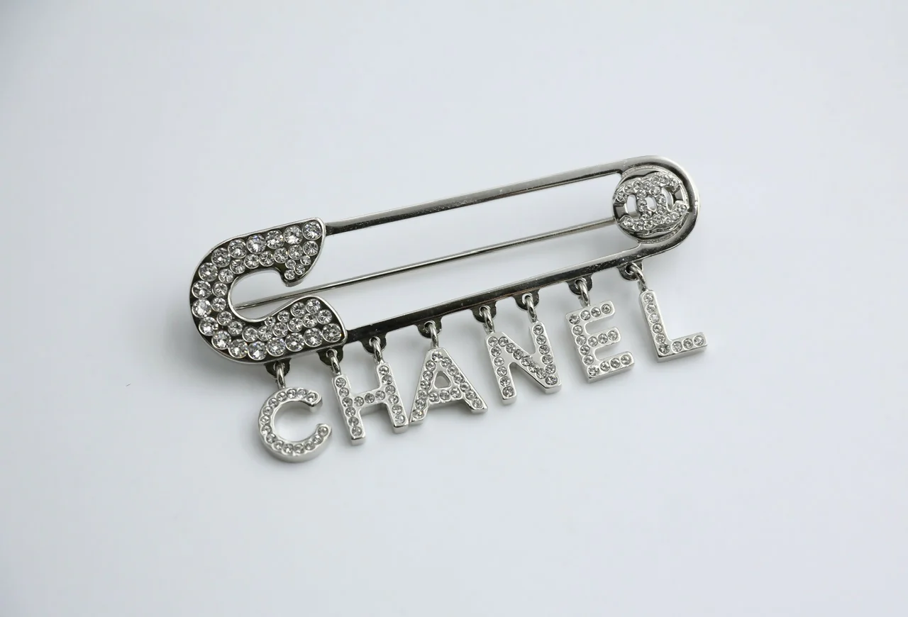 Chanel B18P Rhinestone Metal Thick ‘CHANEL’ Brooch - Image 2