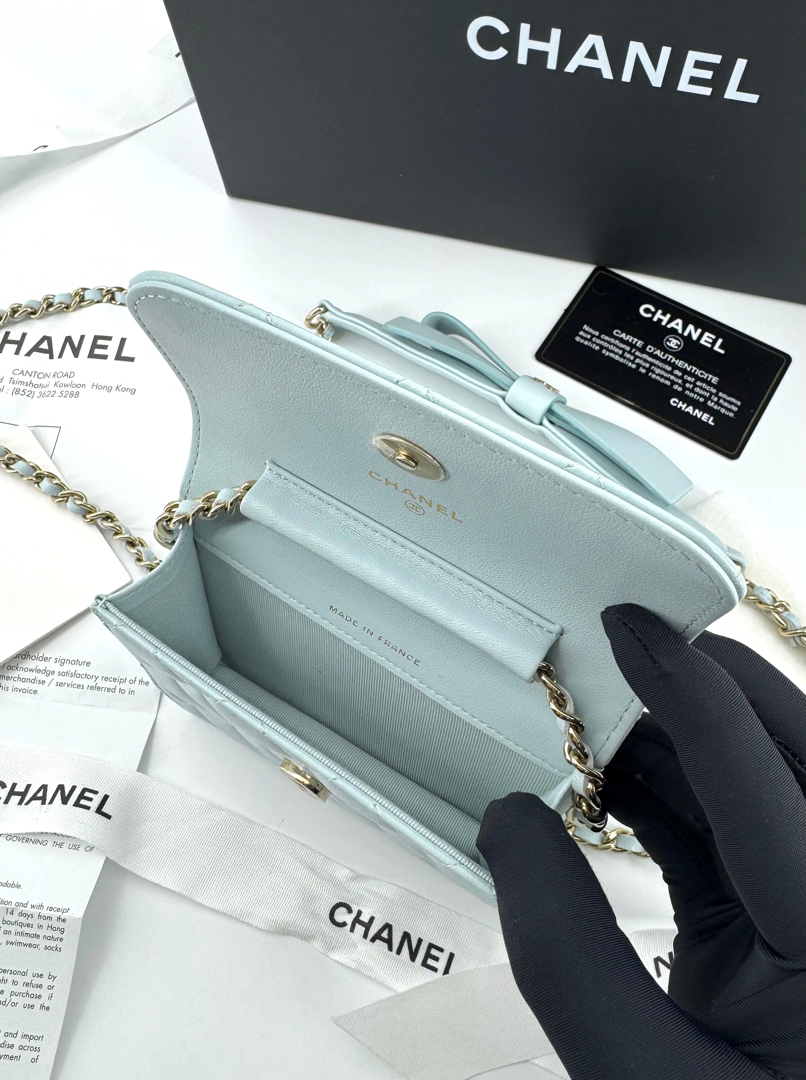 Chanel baby blue quilted leather coin purse with gold chain strap and a bow - Image 3