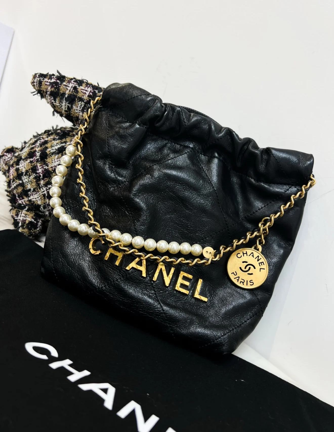 Chanel Black Quilted Calfskin Imitation Pearl Strap Mini 22 Hobo Bag Gold Hardware