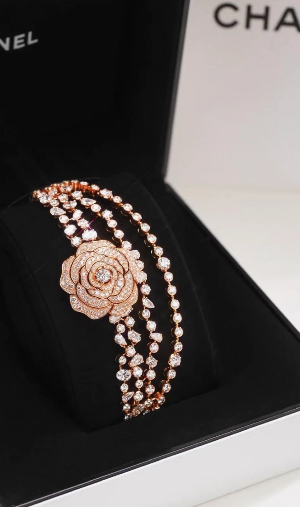 Chanel "Camélia Garden" high jewelry collection features a rose gold tassel chain with full diamonds, detachable camellia brooch, bracelet, and bangle. - Image 2