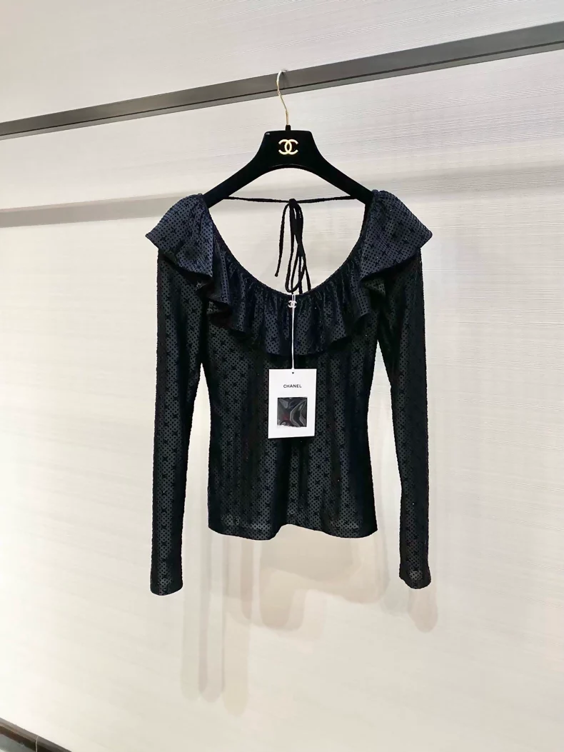 Chanel 24B black top with ruffles