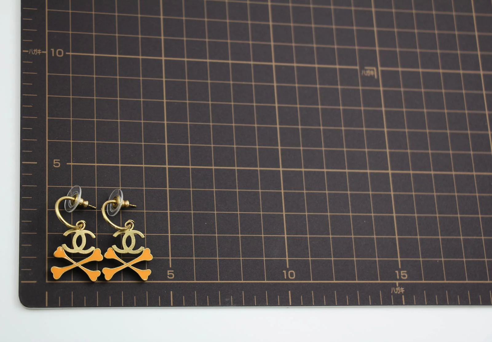 Chanel Vintage 03P Enamel Skull Orange Earrings - Image 13