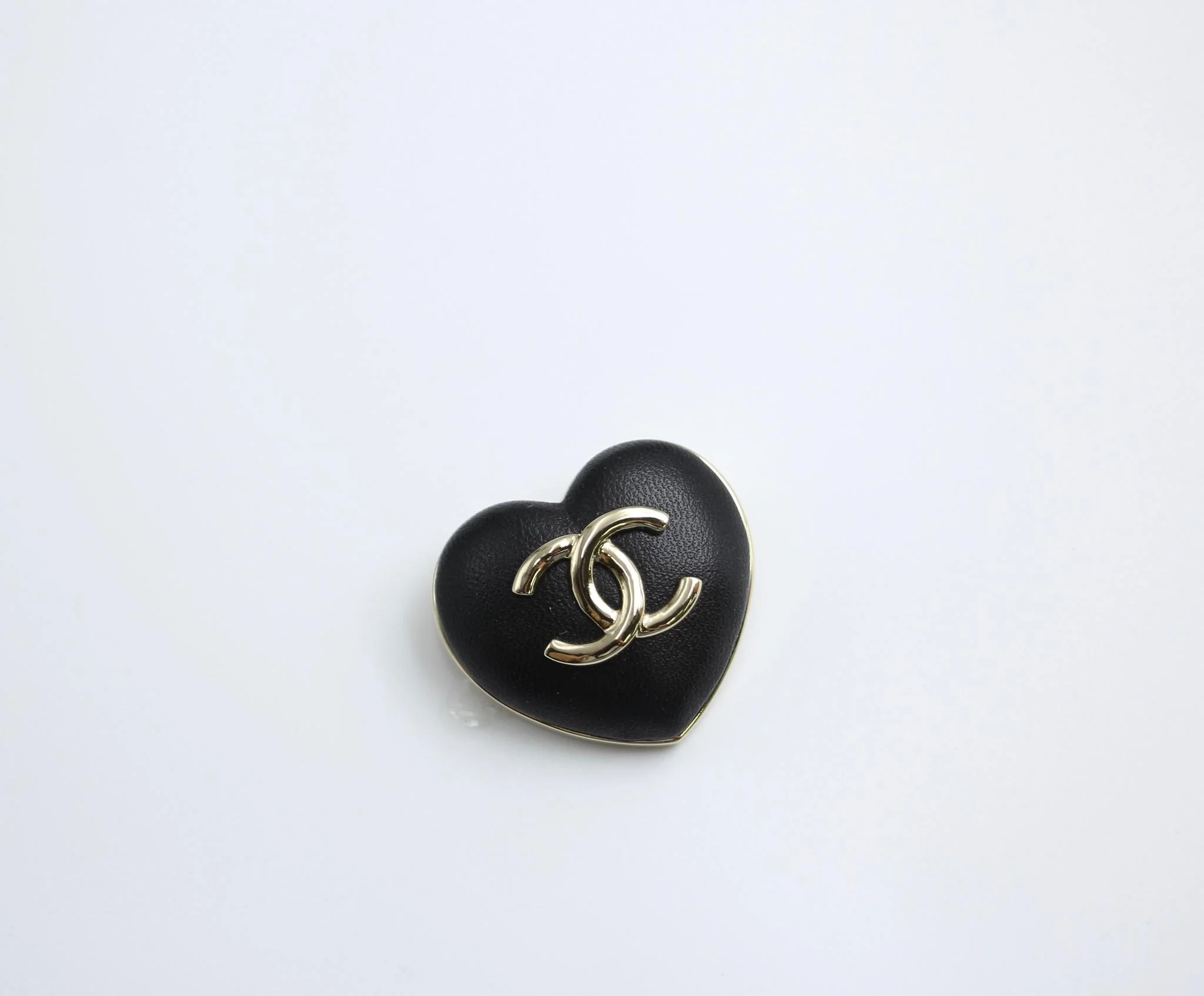 Chanel Vintage 22K Light Gold Metal And Black Leather Heart Brooch