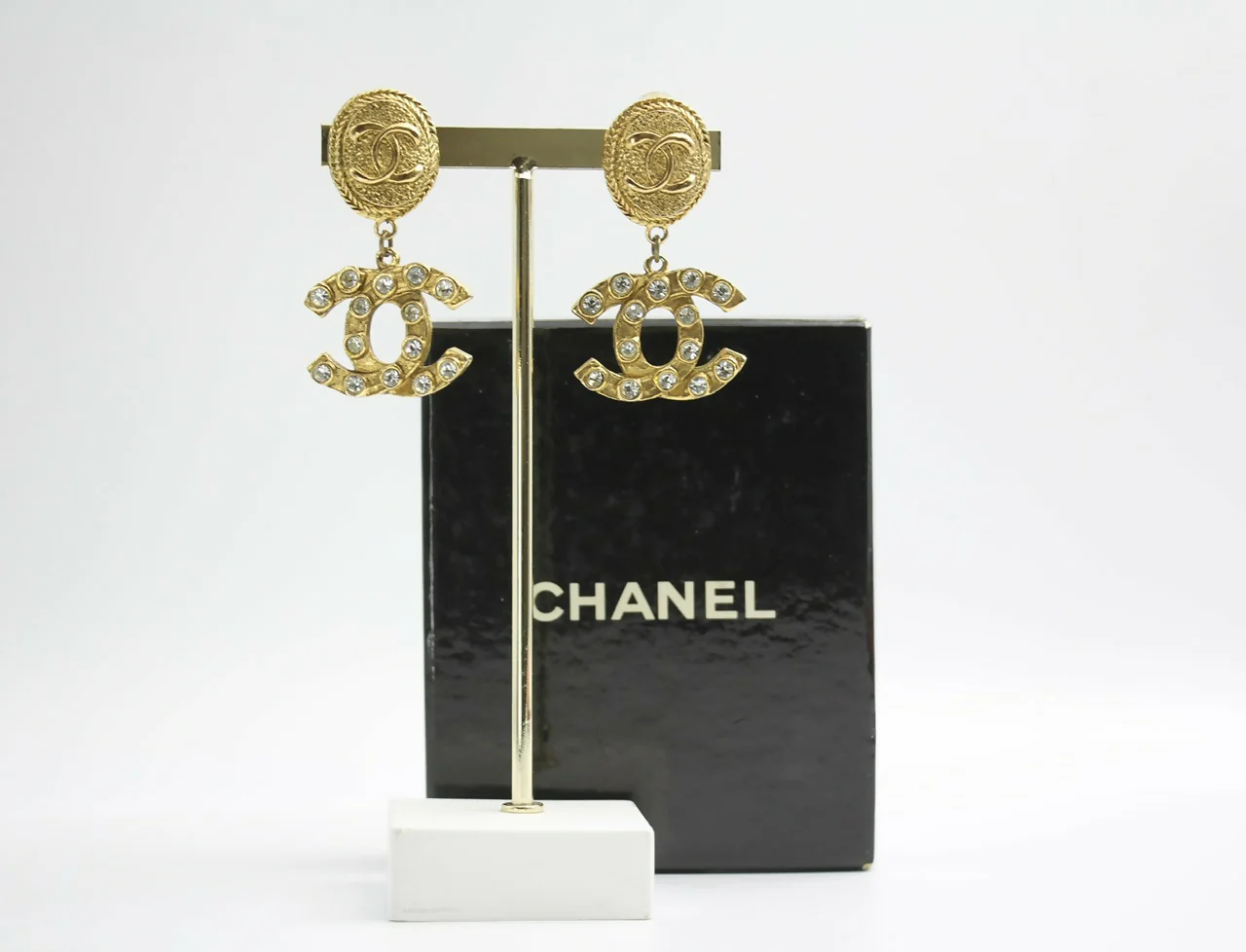 Chanel Vintage 71-80s Rhinestone & Gold-plated Round Relief Dangle Clip-on Earrings