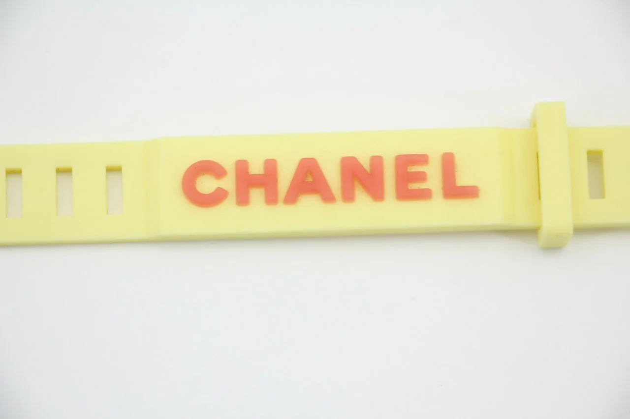 Chanel Vintage 99P Rubber Yellow with Orange Lettering Bracelet - Image 2