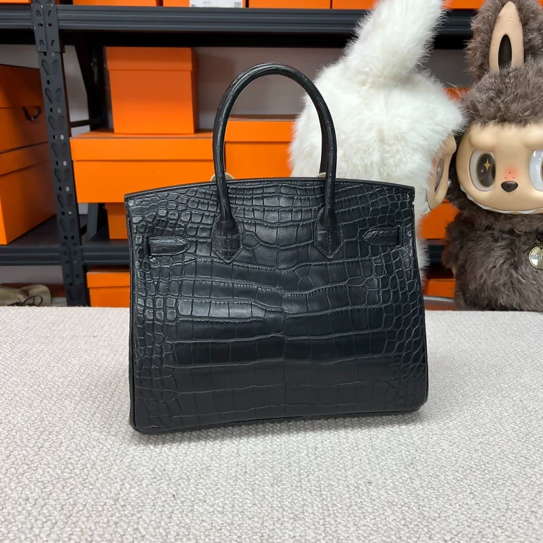 Hermes Birkin 30 black and gold matte crocodile leather gold hardware - Image 2