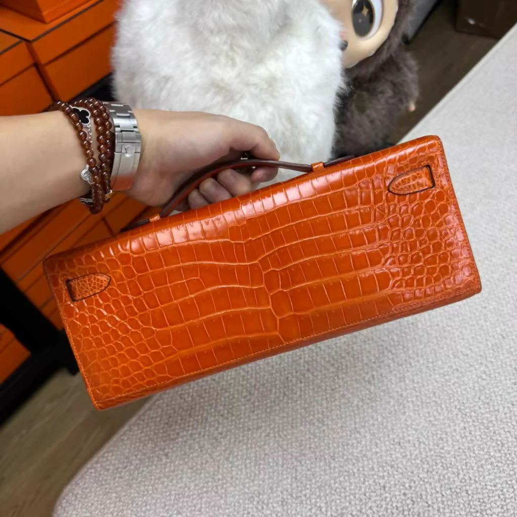 Hermès Kelly Cut Orange Shiny crocodile with Palladium Hardware - Image 2