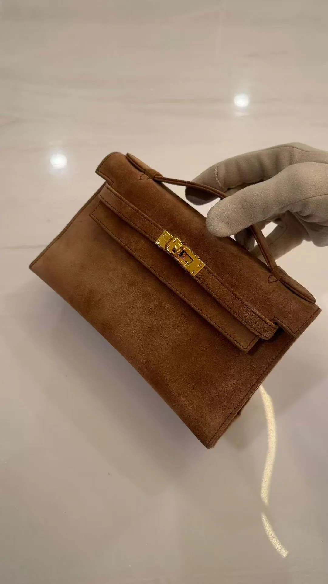 Hermès Kelly Pochette Brown Doblis Leather Gold Hardware