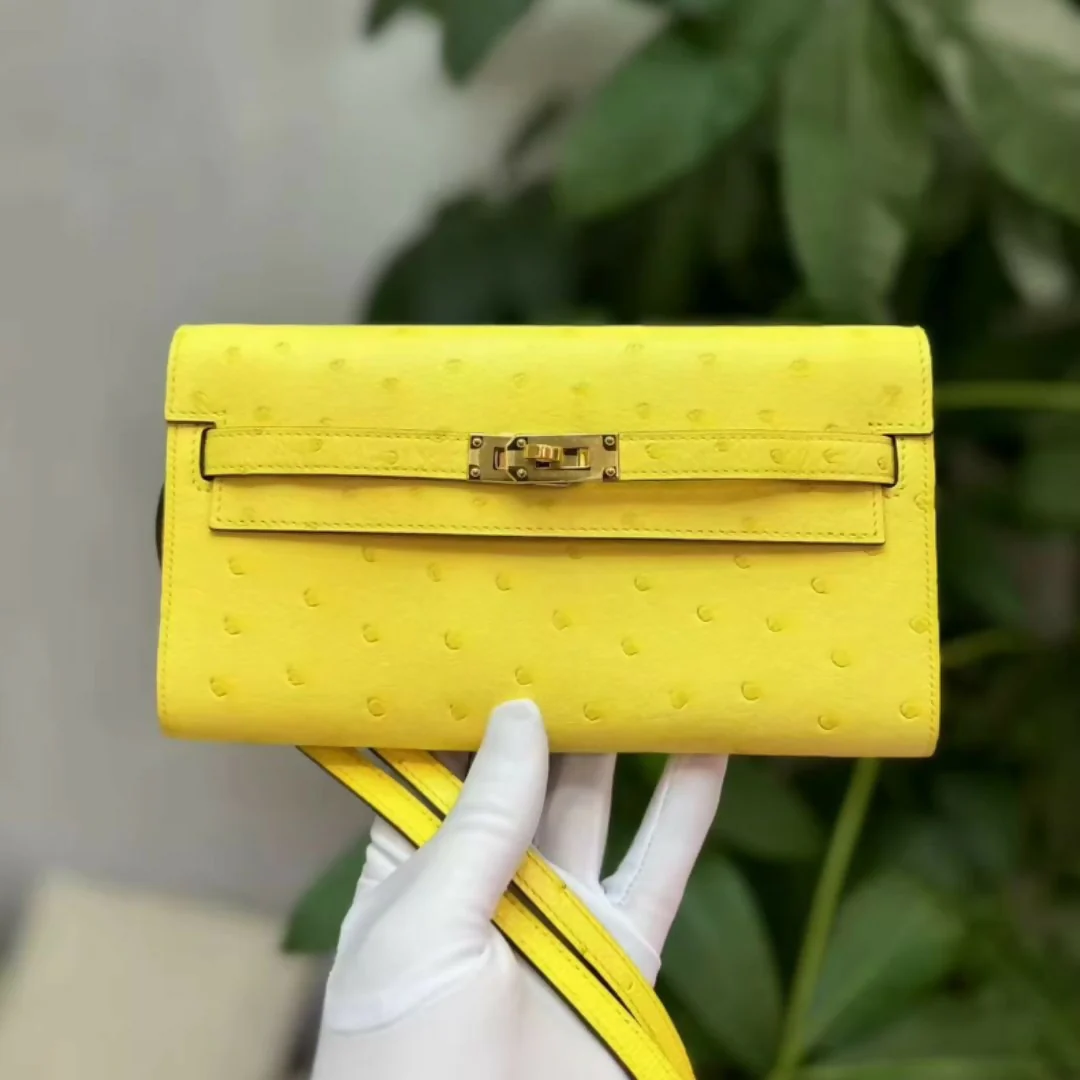 Hermès Kelly To Go Wallet Lime Yellow Ostrich Leather with Gold Hardware