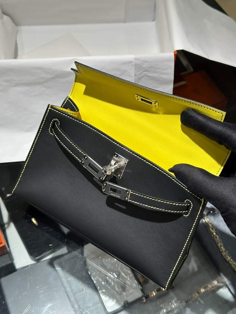 Hermes Kelly Pochette black swift leather with white stitching and yellow inside palladium hardware - Image 2
