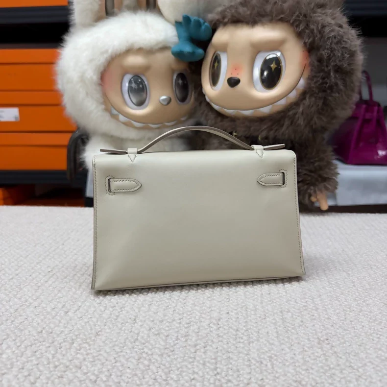 Hermes Kelly pochette craie Swift leather champagne gold hardware - Image 2