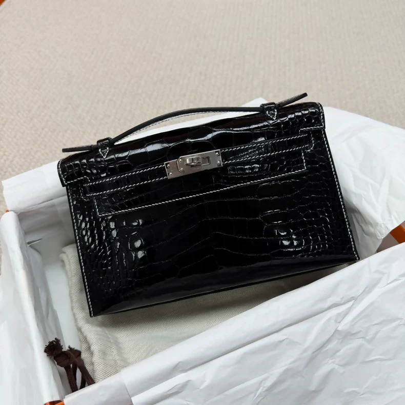 Hermes Kelly pochette black shiny crocodile leather palladium hardware