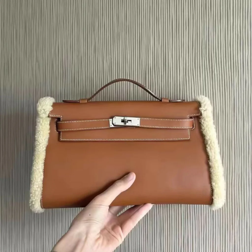 Hermès Teddy plush kelly Pochette Muff