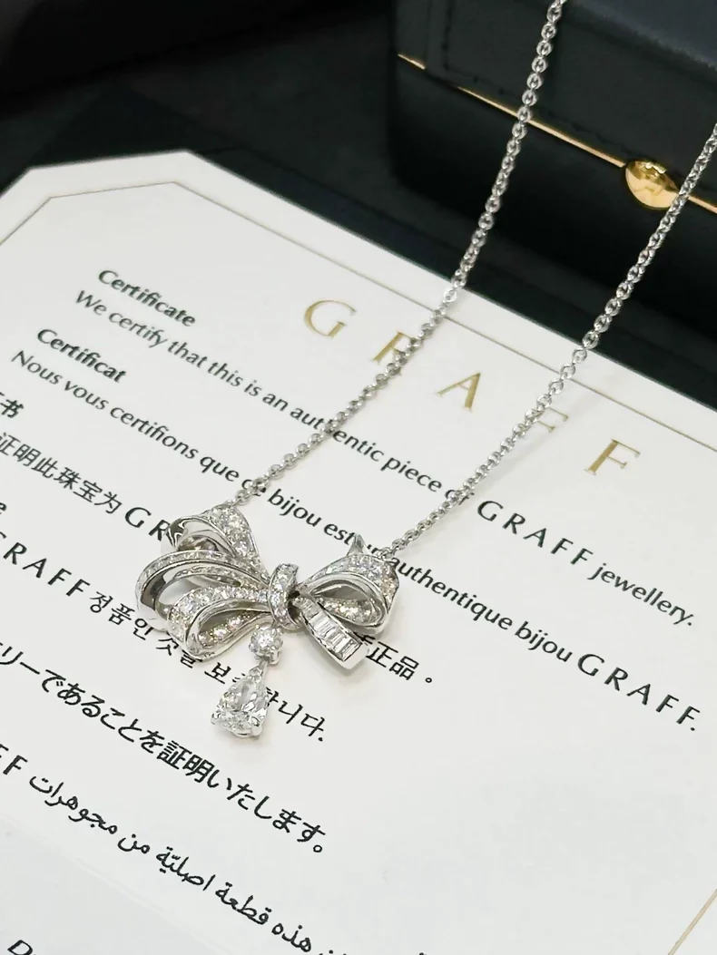 Tilda's Bow Graff necklace in white gold & diamonds - Image 3